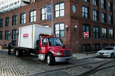 Vinyl door logos installed on tractor cab and box truck in Portland, Oregon
