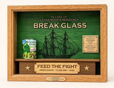 Custom green leadership display with sailing ship artwork and a Feed the Fight presentation plaque.
