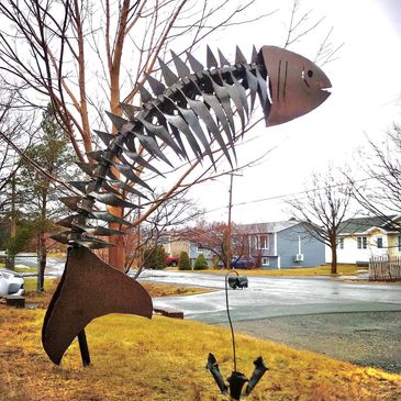 Backbone, made from recycled fishing ship hull, durable steel like our people and fishing industry