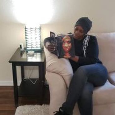 Black woman reading a book