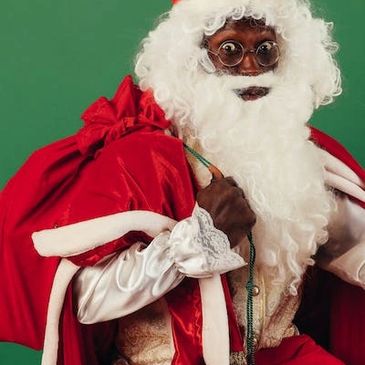 African American Santa Claus wearing glasses