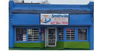 Smithville Wireless store with a blue and green exterior.