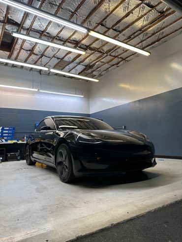 2023 Tesla Model Y Tinted inside the shop