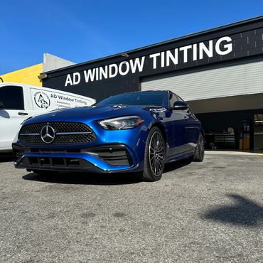 2023 Mercedes benz C300 Tinted and parked in front of the shop