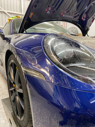 Blue Porsche 911 PPF on Front Left Fender