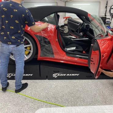 Red Porsche 911 PPF on Rear fenders and doors