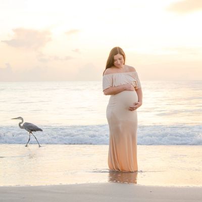 pregnant woman on beach in florida