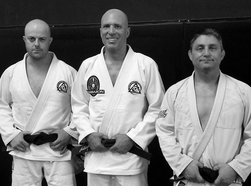 Professor Alex Rendon, UFC Hall of Famer Royce Gracie, and Professor Tony Torres-Aponte