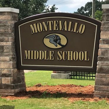 Dimensional Sign with Rock Pillars