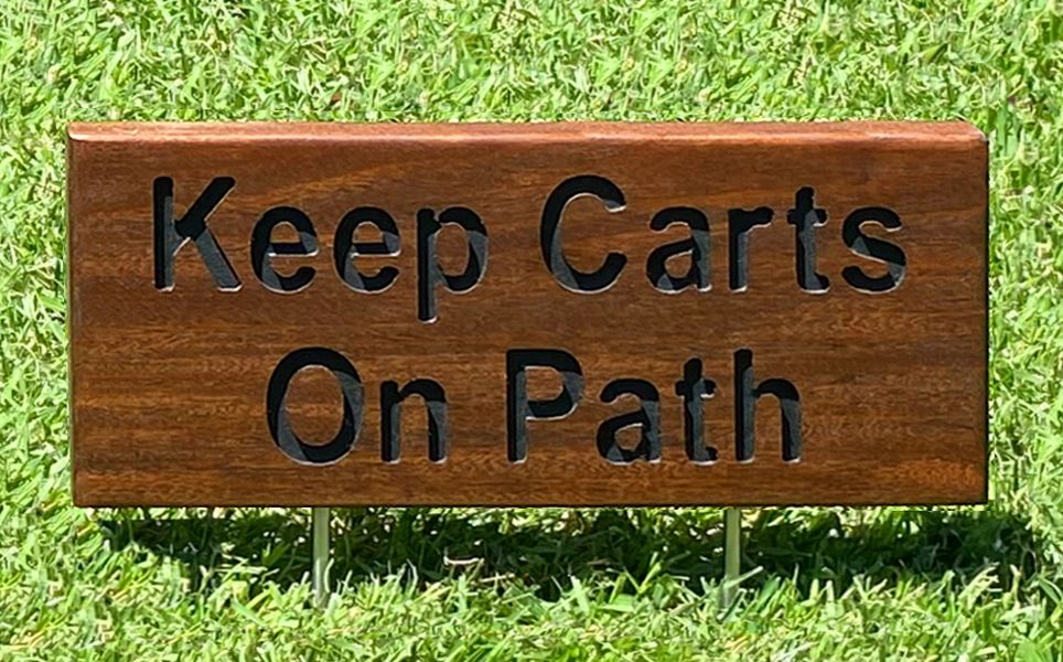 keep carts on path wood directional sign