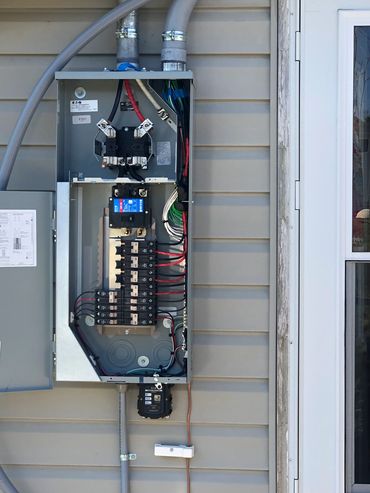 Inside a panel during a service upgrade and relocation.