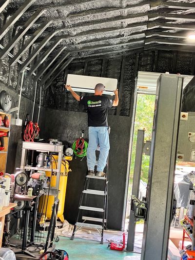 Chad Technician installing a mini split