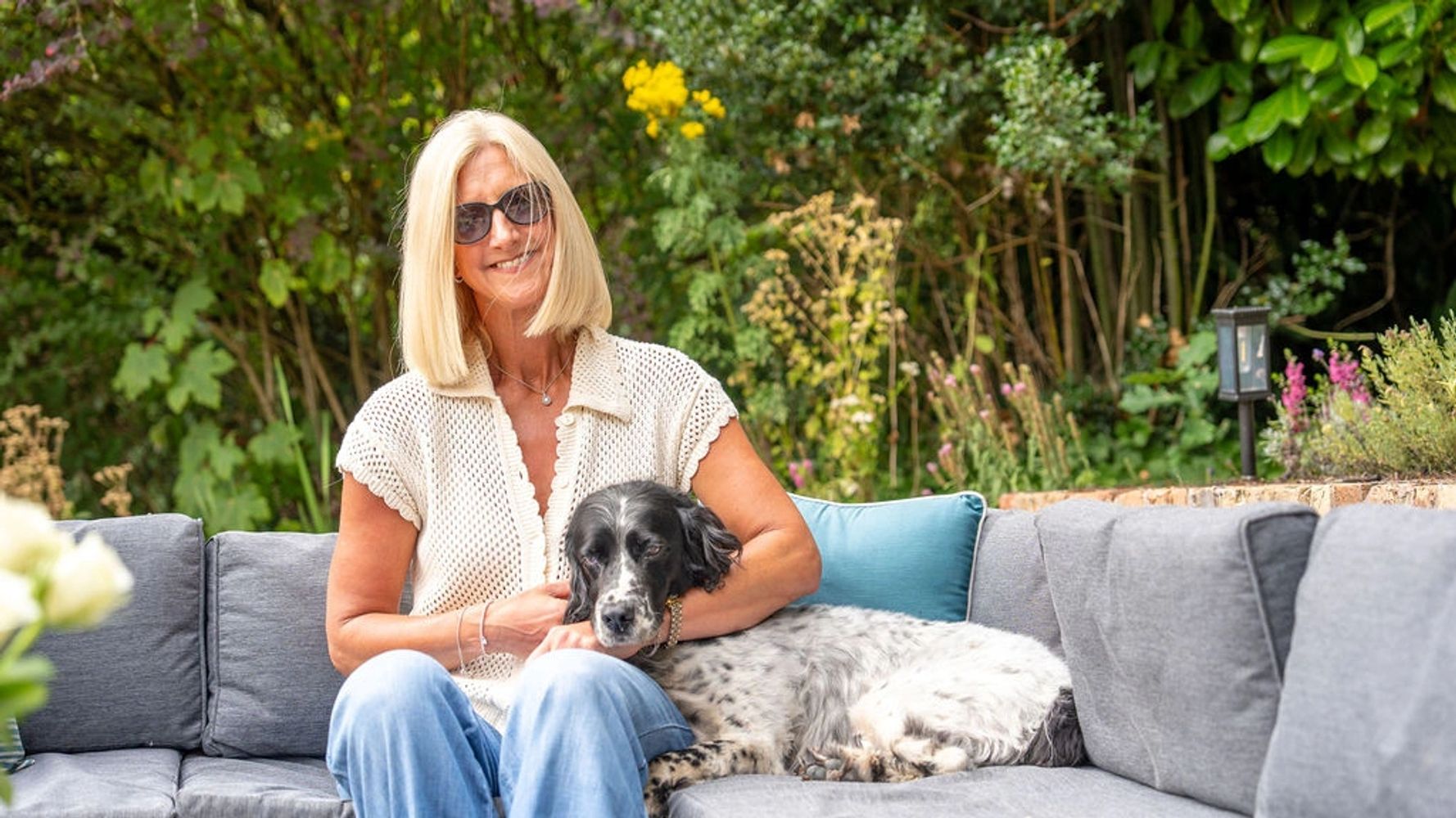 Image of Vicky Braddock, health and nutrition coach at the Coaching Barn with her dog Alfie.