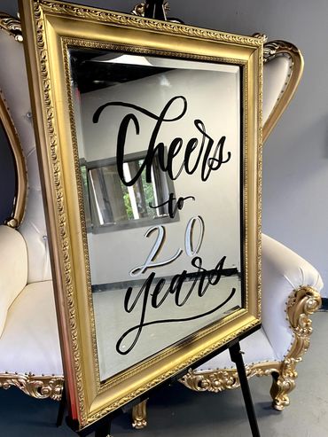 Hand lettered retirement party sign on a mirror by Nashville calligrapher