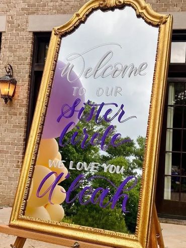 Hand lettered party sign on a mirror by Nashville calligrapher