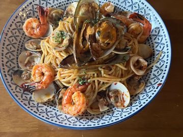 “Garlic, olive oil, chili, and fresh seafood tossed with spaghetti.”