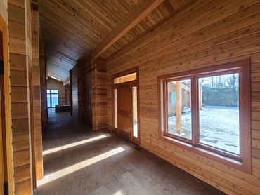 Ontario-Restored interior wooden walls and floors with professional wood restoration and refinishing.