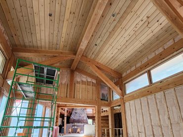 Muskoka home wood ceilings and beams restored with media blasting and stain.