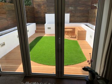 Hardwood decking artificial grass block planters fencing batten fencing decking twickenham
