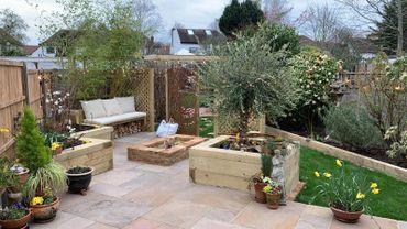 Landscaping landscape design railway sleepers paving patios turfing fire pit