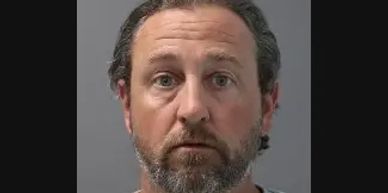 The teacher was charged with engaging in a sexual relationship with a minor, police say.