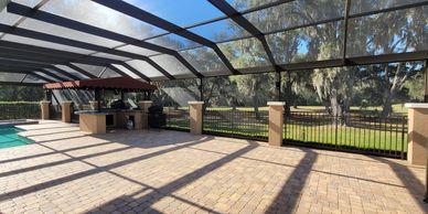 The Clear View Screen Enclosure is a modern and stylish way to enclose your backyard oasis.
