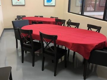 2 tables for sitting, with additional one for materials or supplies for your meeting.