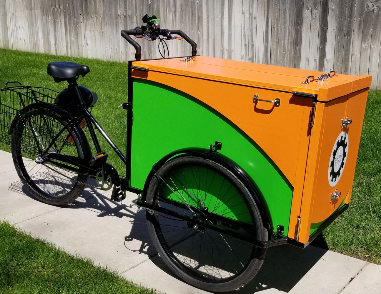 A black, orange, and green book bike called Paperback Rider.