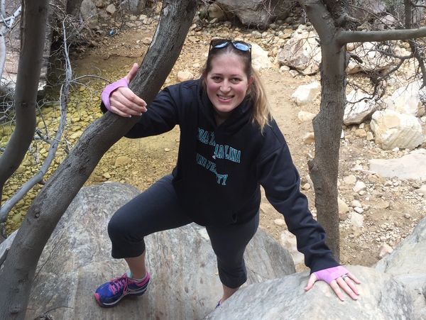 Coach Irene hiking and climbing to stay fit