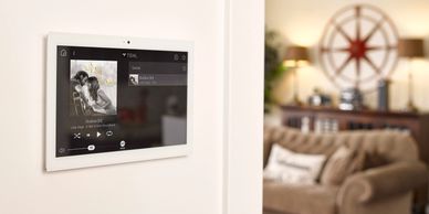 Control4 Connected Home Touchscreen playing Pandora on multi room audio system
