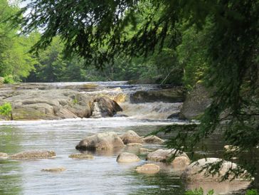 View of a river with waterfall in Kejimkujik National Park in Nova Scotia, Nova Scotia National Park