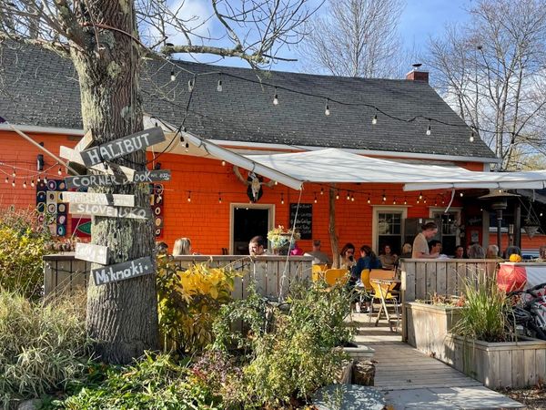 Mateus Bistro patio with customers dining outside in Mahone bay, Nova Scotia