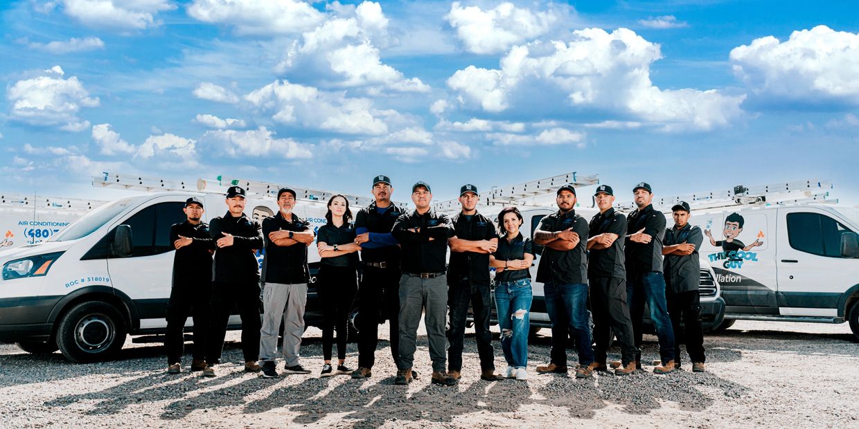 Image of HVAC team with technicians and service vehicles