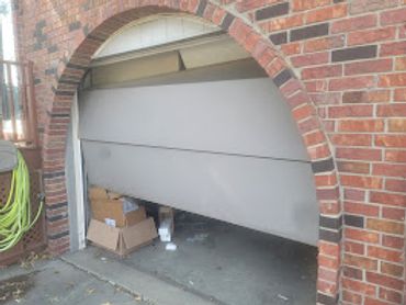 Before Fixed Garage Door
