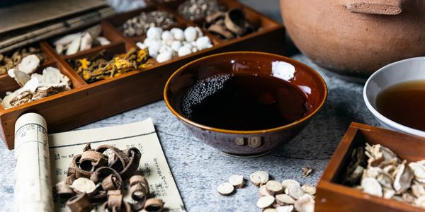 Traditional Chinese medicinal herbs with herbal tea.
