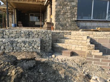 Stonework and Dressing landscaping to follow