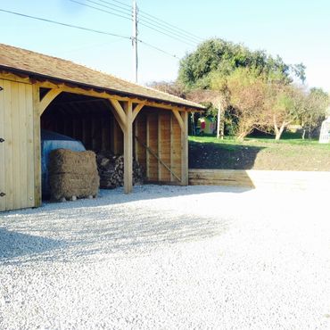 Garage port and garden store