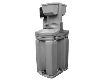 A tall, gray industrial water softener unit.