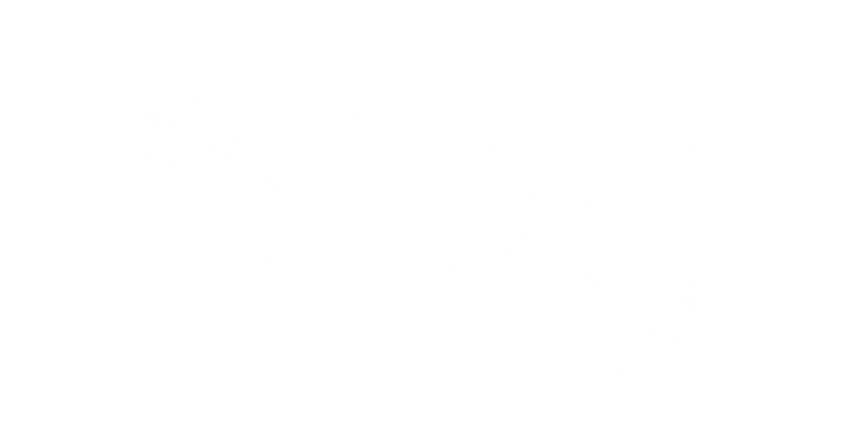 A serene lake with a small boat and a rocky island at sunset.