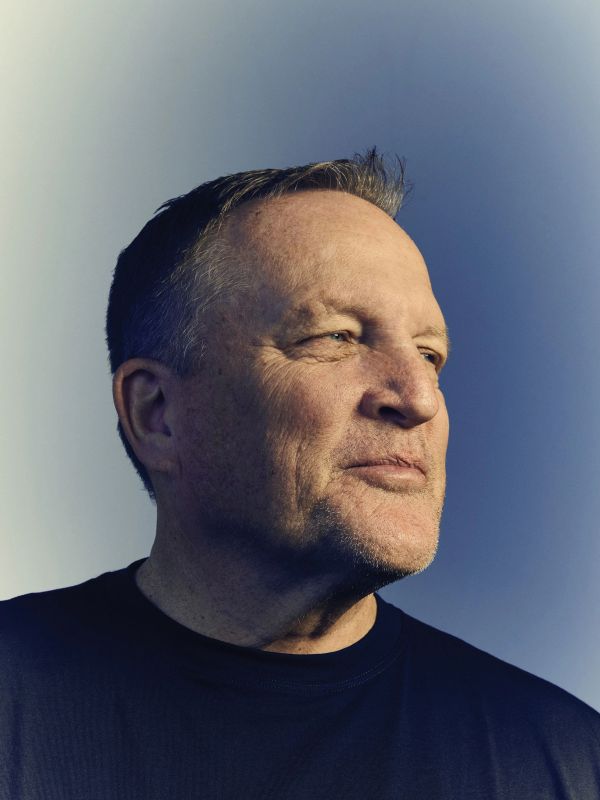 Profile of a contemplative middle-aged man.