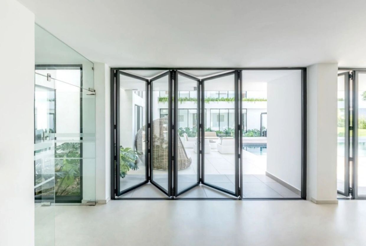 Cortizo GB49 bifold doors – slim 110mm frames, smooth folding action, secure and thermally efficient