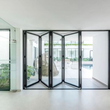 Cortizo GB49 bifold doors – slim 110mm frames, smooth folding action, secure and thermally efficient