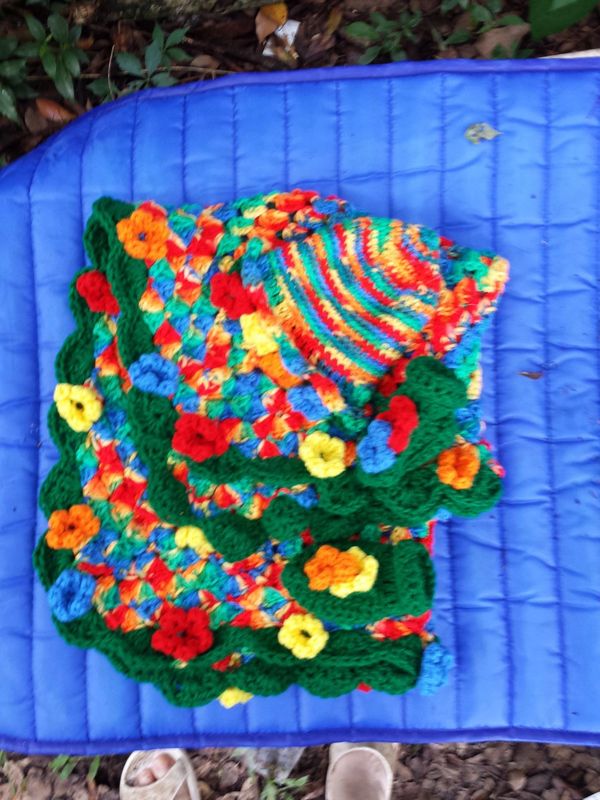 cap, sweater, and booties crocheted