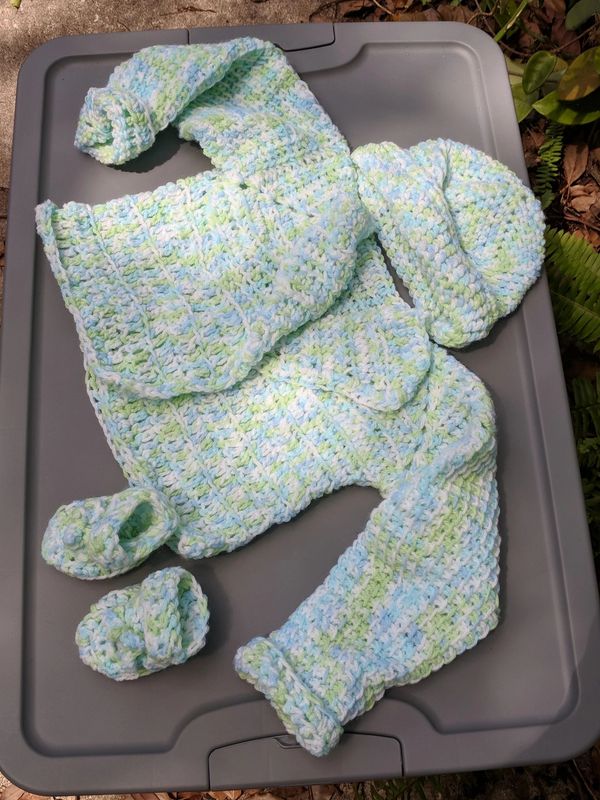 Crochet sweater cap and booties