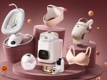 Collection of baby care and nursing products in soft pink tones.