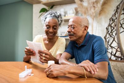 Older couple reviewing medical information together.
