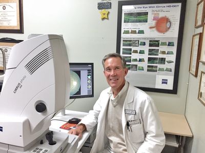 Dr. Fimreite using the latest OCT technology to image the retina and screen for certain eye diseases