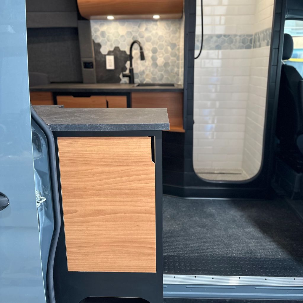 Handcrafted conversion van interior built by Virginia Beach van builders