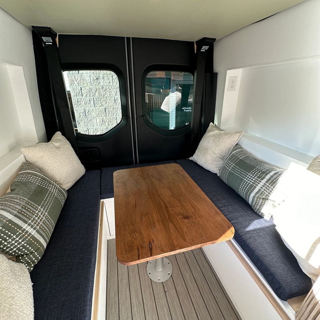 Luxury van conversion built in Virginia Beach with detailed cabin interior