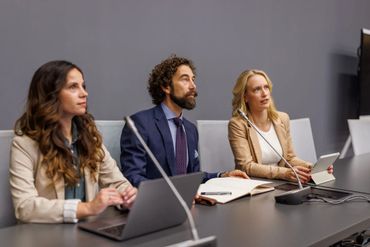 Colleagues working on laptops